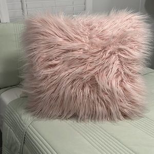 Fuzzy pink pillow